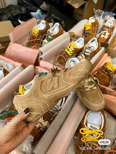 Miu Miu & New Balance Sneakers