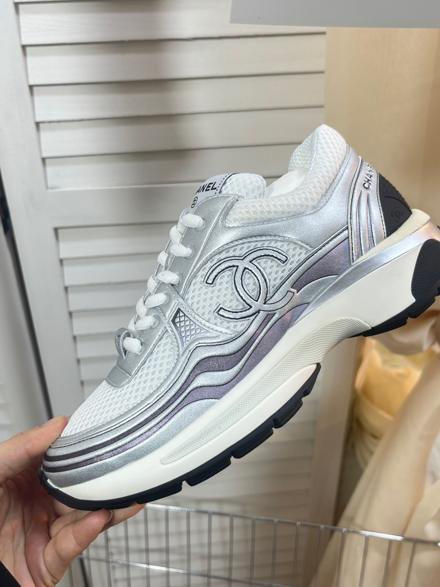 CHANEL Gold and silver horn king sneakers