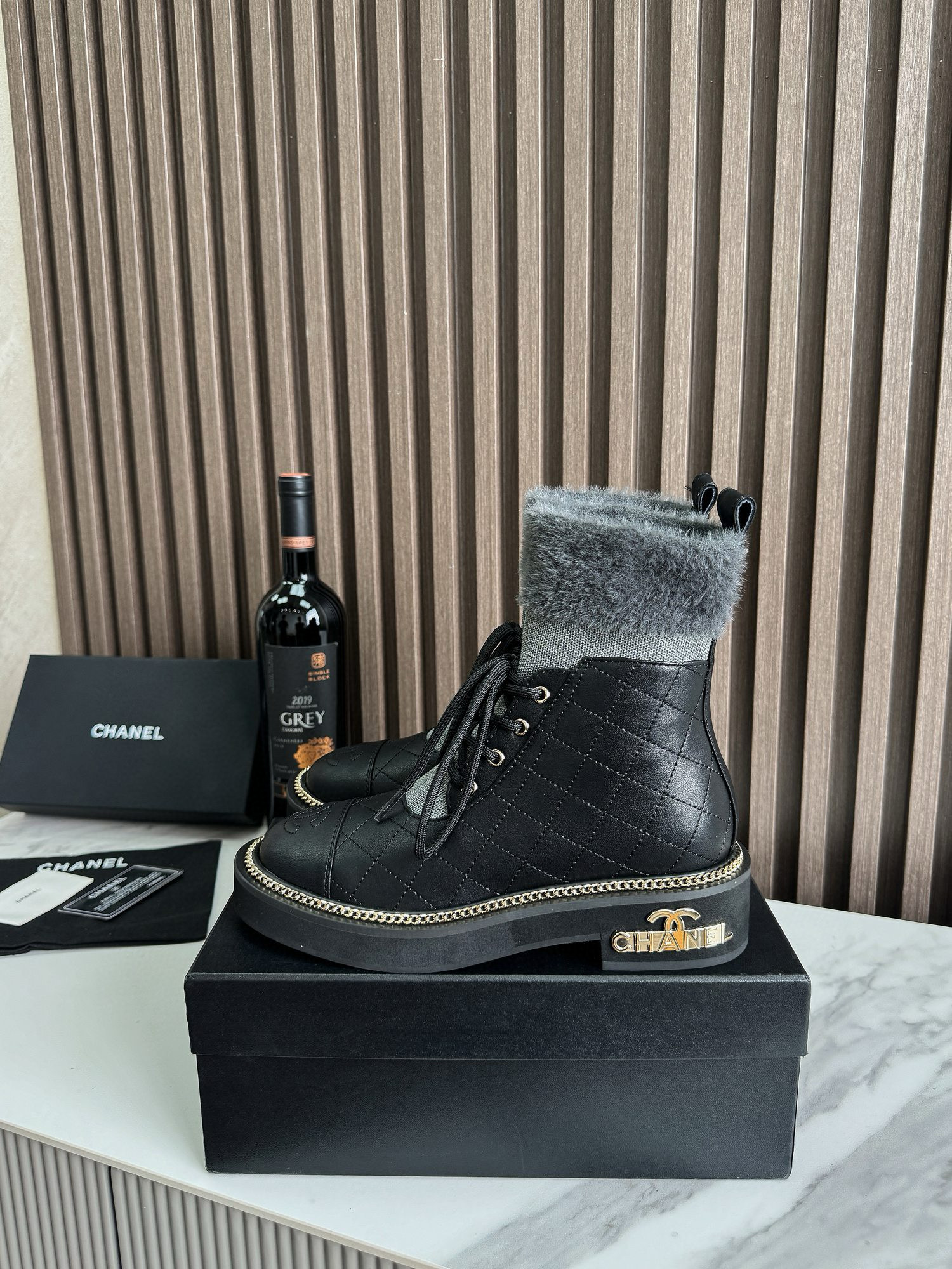 CHANEL ankle boots with fur collar