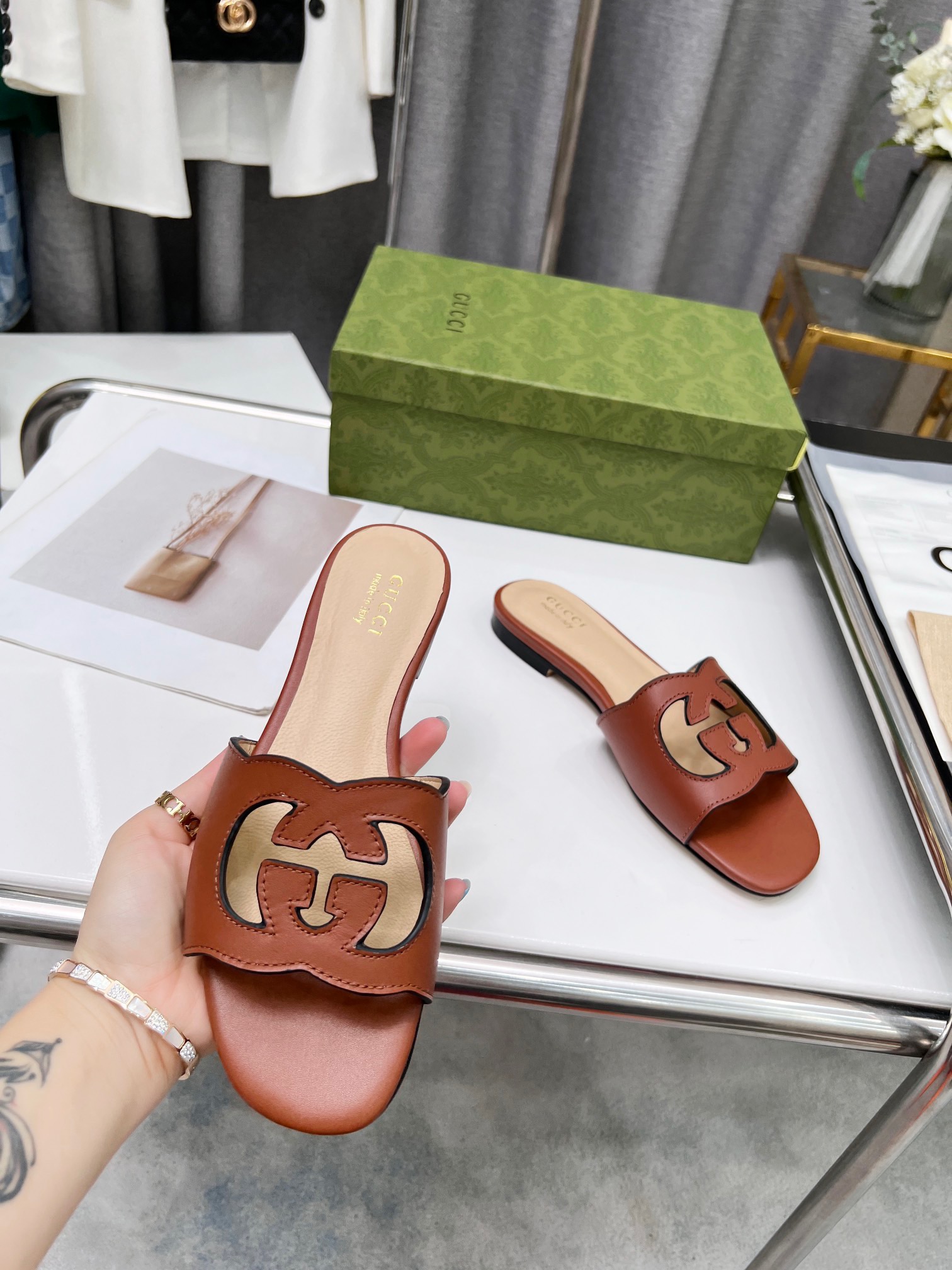 Gucci Women's interlocking double G hollow-out detail slippers