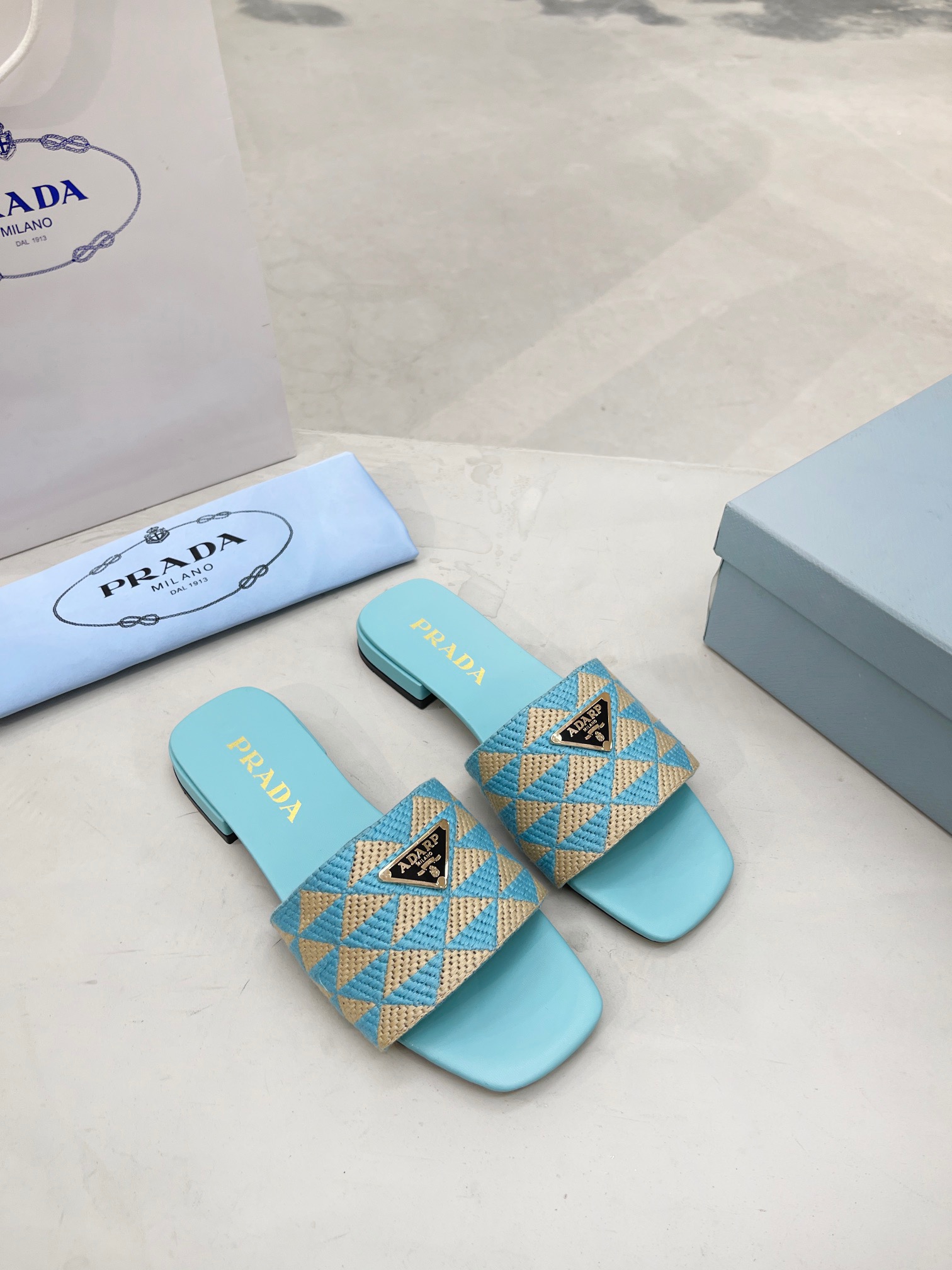 PRADA Triangle printed fabric slippers