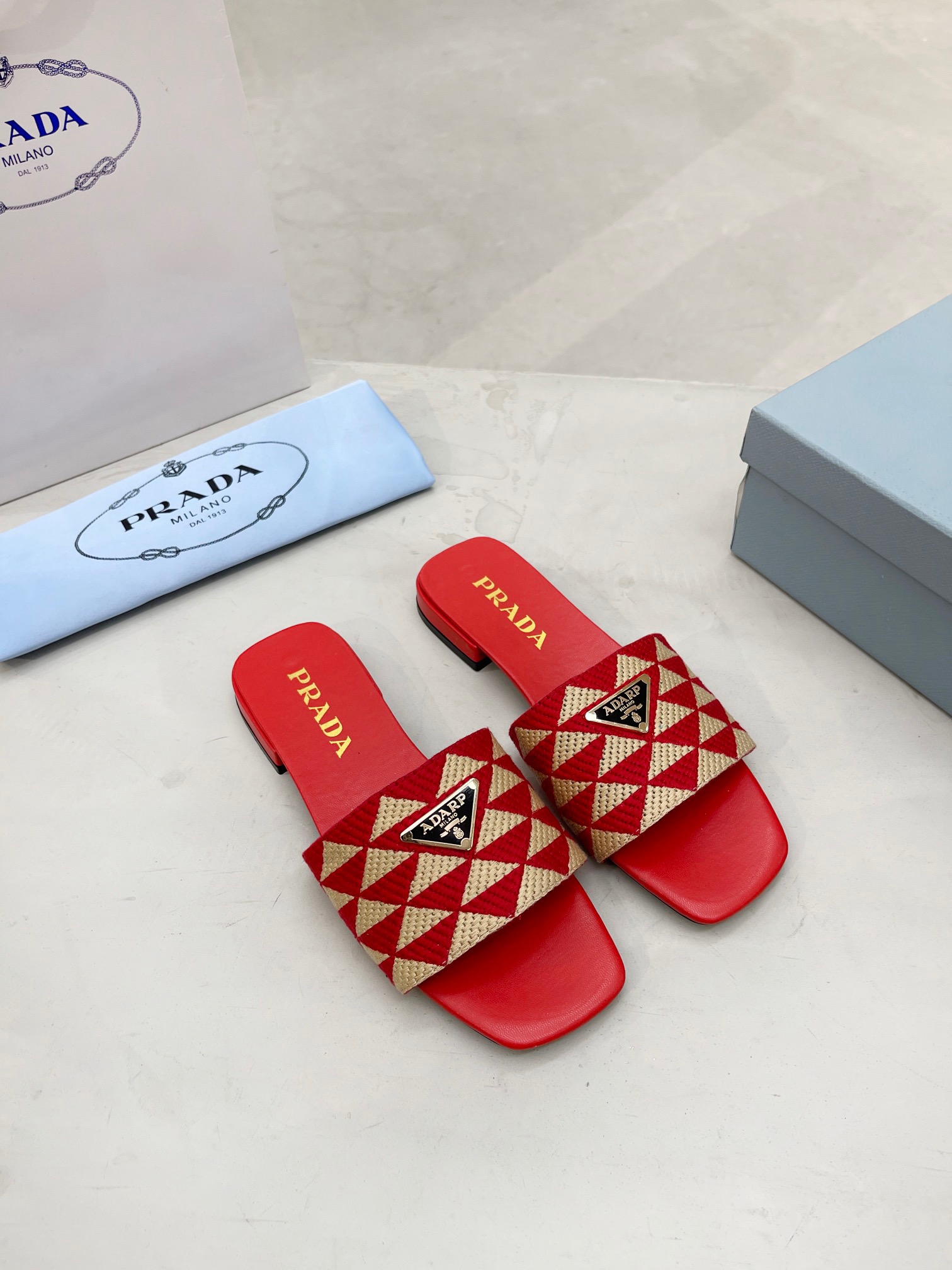 PRADA Triangle printed fabric slippers
