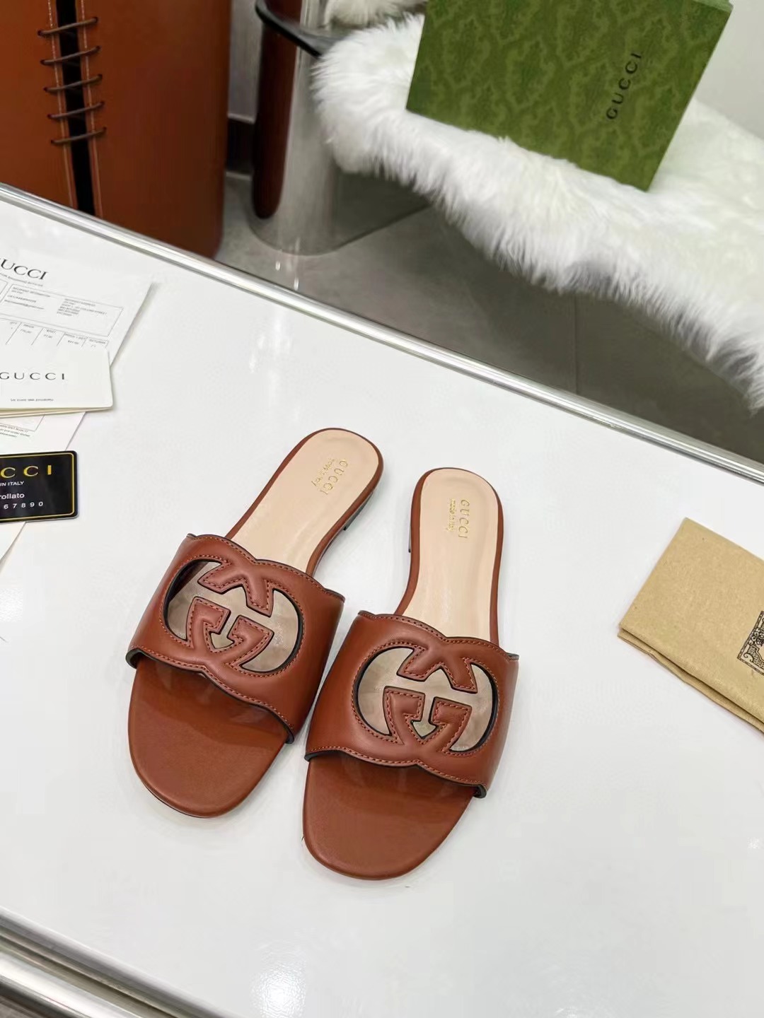 GUCCI Women's double G hollow slippers