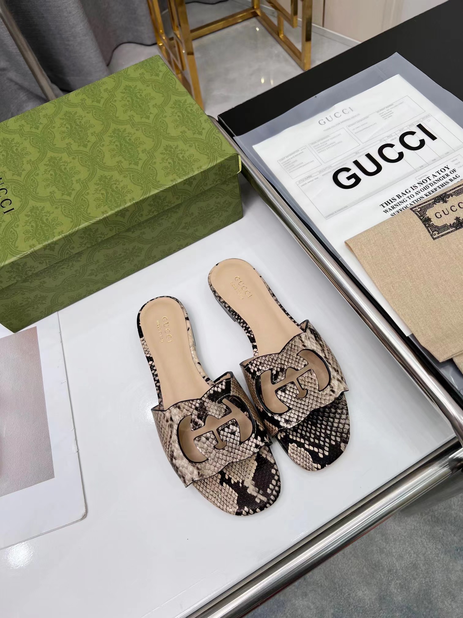 GUCCI Women's double G hollow slippers