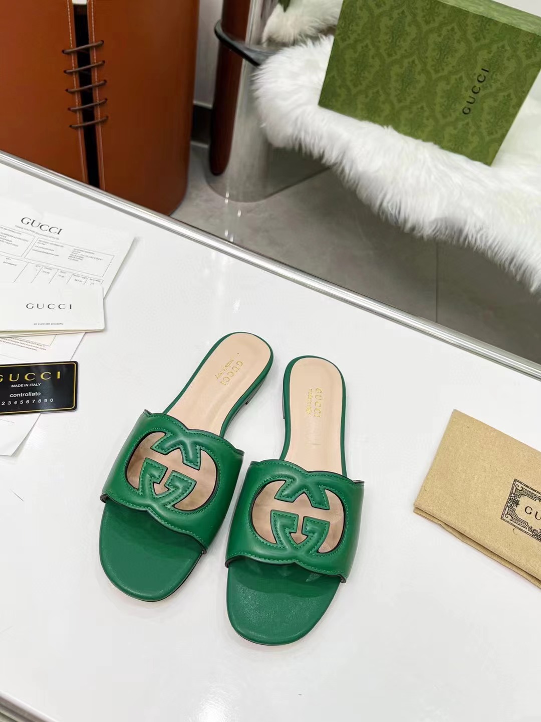 GUCCI Women's double G hollow slippers