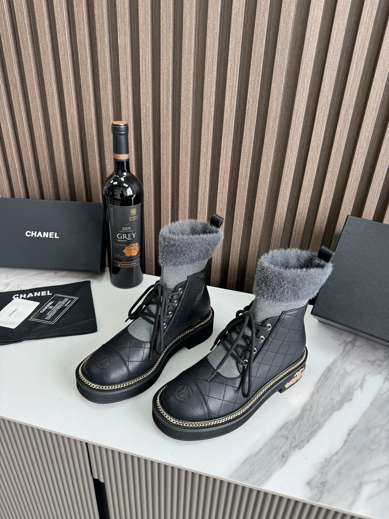 CHANEL ankle boots with fur collar